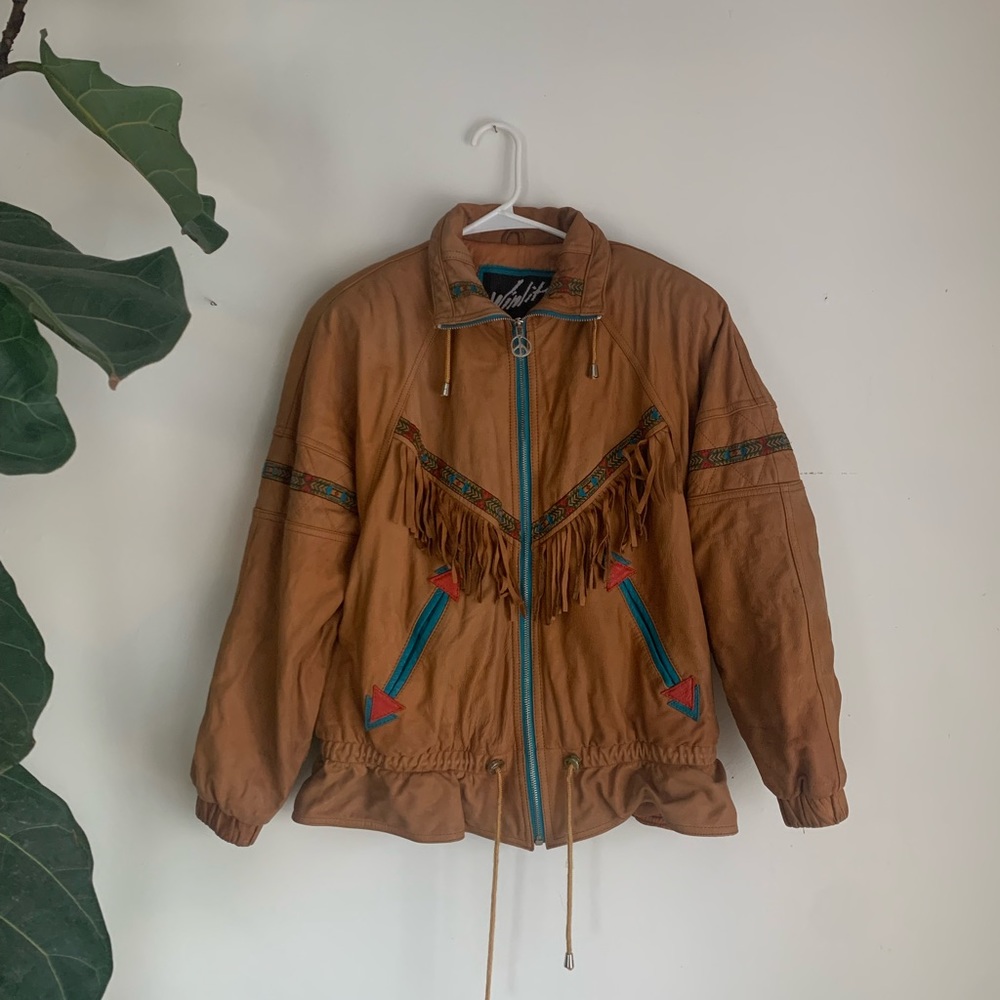 Vintage leather jacket with fringe and appliqué